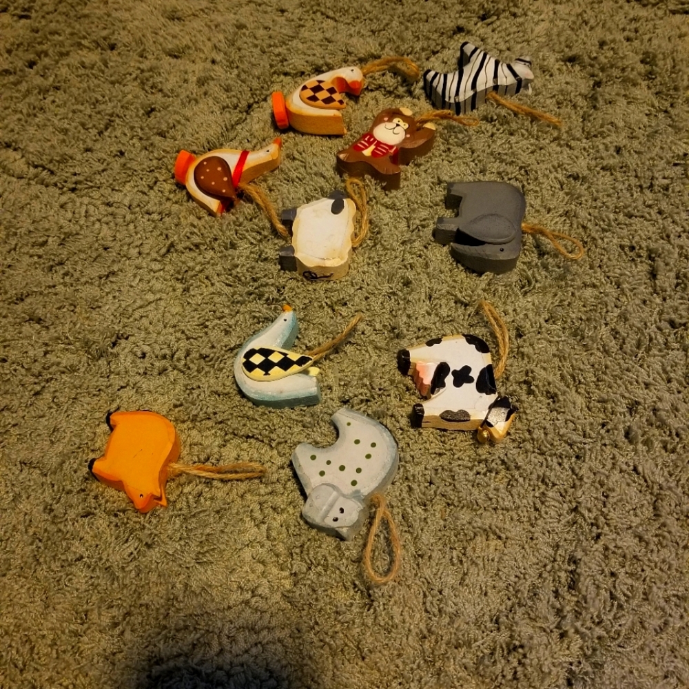 Assorted wooden carved animals for baby crafts